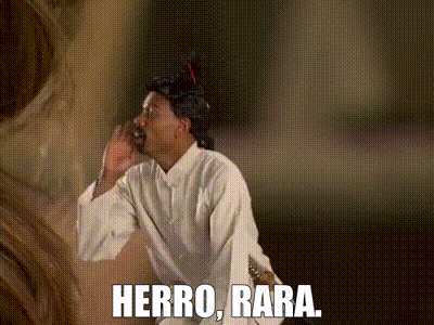 Man In Wig And White Shirt Saying Herro Bara GIF