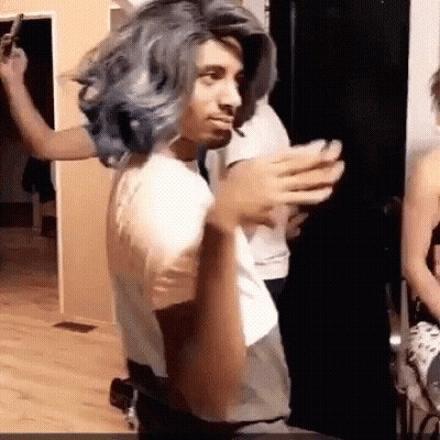 Man In Wig And White Shirt With People GIF