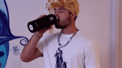 Man In Wig Drinking From Bottle GIF