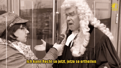 Man In Wig Interviewed By Woman Ich Kann Recht So Jetzt Jetzo So Ertheilen GIF