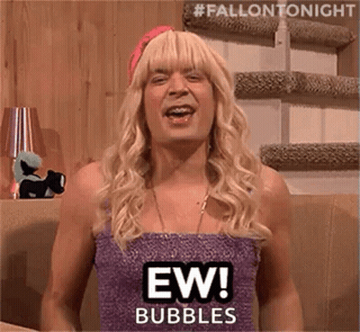Man In Wig Making Funny Face GIF