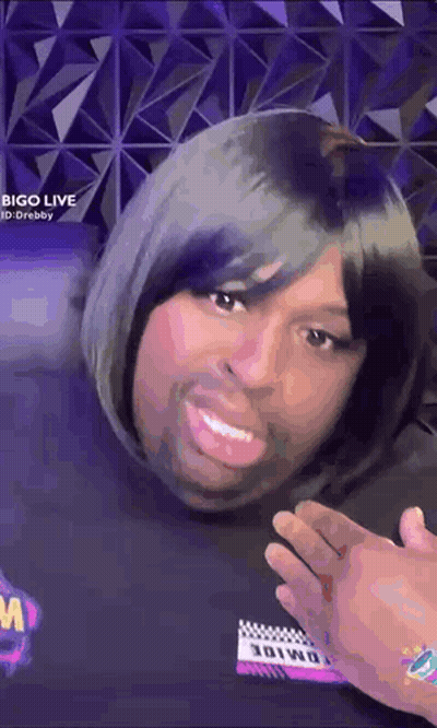 Man In Wig Making Funny Face Talking GIF