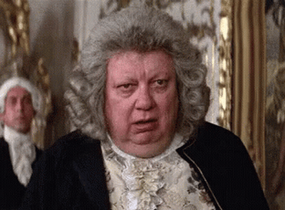Man In Wig Making Funny Face With Others GIF