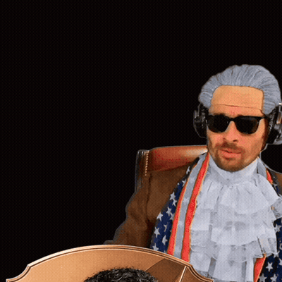 Man In Wig Next To Card Saying RW GIF