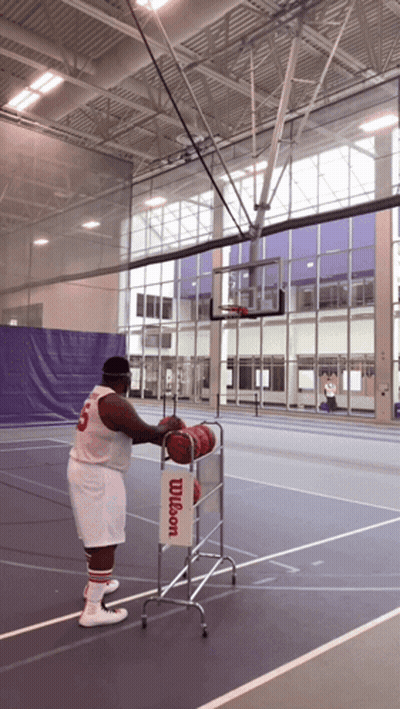 Man In Wilson Jersey Holding Basketball GIF