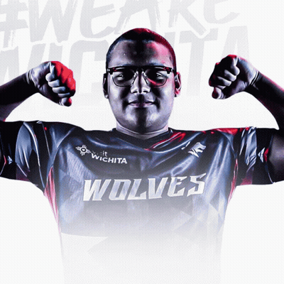 Man In Wolf Shirt Flexing Muscles GIF