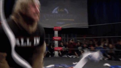 Man In Wrestling Ring All In Shirt GIF