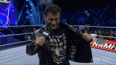 Man In Wrestling Ring Holding AEW Microphone GIF