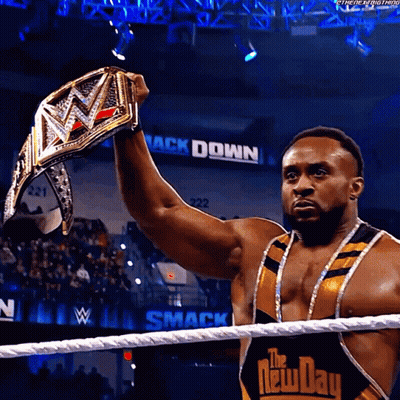 Man In Wrestling Ring Holding Championship Belt GIF