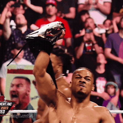 Man In Wrestling Ring Holding Trophy #Tiffanyluv24 GIF