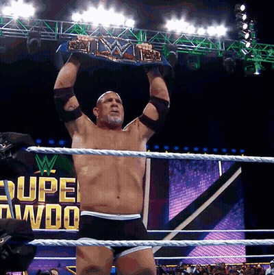 Man In Wrestling Ring Holding WWE Championship Belt GIF