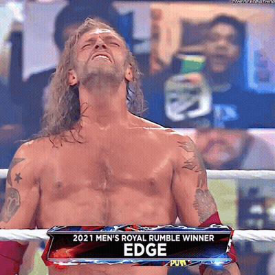 Man In Wrestling Ring With 2021 Men's Royal Rumble Winner Sign GIF