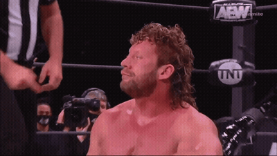 Man In Wrestling Ring With AEW Gloves GIF