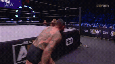 Man In Wrestling Ring With AEW Logo GIF