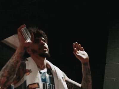 Man In Wrestling Ring With Crowd Watching GIF