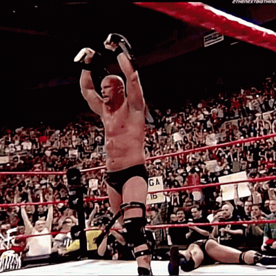Man In Wrestling Ring With GA Sign GIF