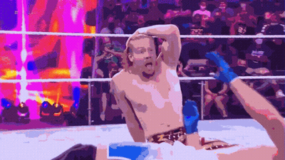 Man In Wrestling Ring With Hash On Shirt GIF
