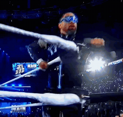 Man in Wrestling Ring With Jet Usd Sign