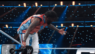 Man In Wrestling Ring With Letter W On Ropes GIF