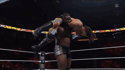 Man In Wrestling Ring With Next Turn Sign GIF
