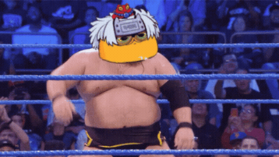 Man In Wrestling Ring With Ninja On Head GIF
