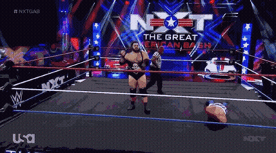 Man In Wrestling Ring With NXT GIF