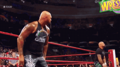 Man In Wrestling Ring With Referee GIF