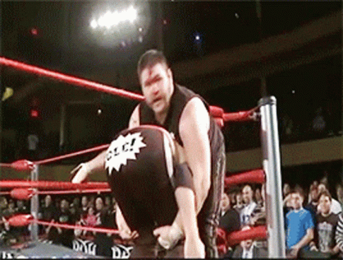 Man In Wrestling Ring With Smack Sticker GIF