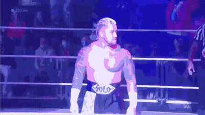 Man In Wrestling Ring With Solo Belt GIF