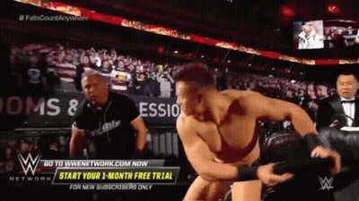 Man In Wrestling Ring With Start Your 1 Month Free Trial Sign GIF