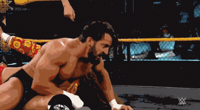 Man In Wrestling Ring With W Logo GIF