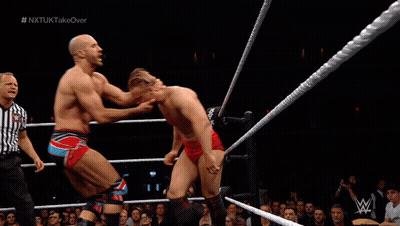 Man In Wrestling Ring With W Logo GIF