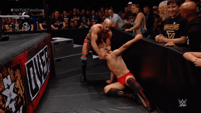 Man In Wrestling Ring With W Logo GIF