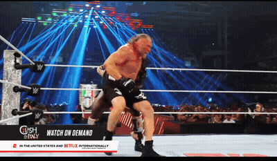 Man In Wrestling Ring With Watch On Demand Sign GIF