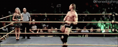 Man In Wrestling Ring With Woman Behind Nextbigthing GIF