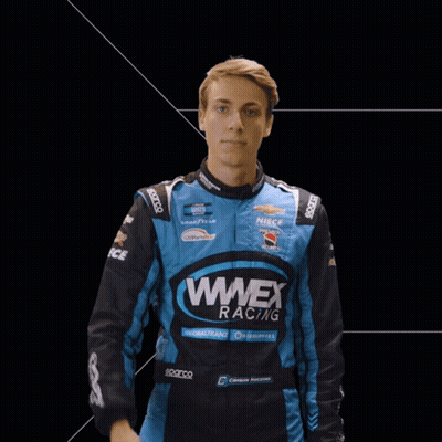 Man In Wrex Racing Jacket Pointing GIF