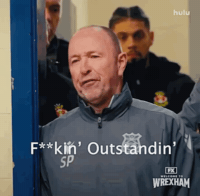 Man In Wrexham Jacket Saying Outstanding GIF