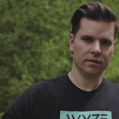 Man In Wyze T-Shirt Making Gesture GIF