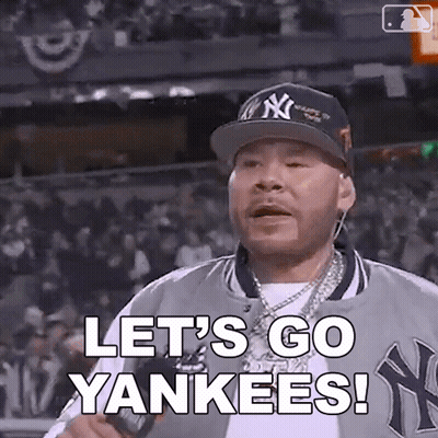 Man In Yankees Hat And Jacket Says Let's Go Yankees GIF