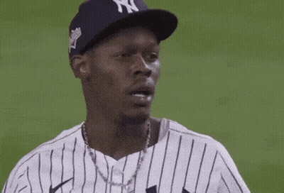 Man In Yankees Hat Scratching Head GIF