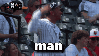 Man In Yankees Hat Sitting In Stadium Says Man GIF