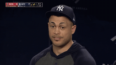 Man In Yankees Hat Smiling At Baseball Game GIF