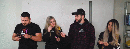Man In Yankees Hat Standing With Two People GIF