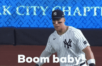 Man In Yankees Jersey On Baseball Field GIF