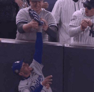 Man In Yankees Jersey Shaking Hands GIF