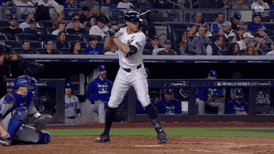 Man In Yankees Uniform Holding Bat GIF