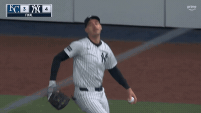 Man In Yankees Uniform Throwing Ball GIF