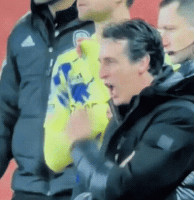 Man In Yellow Adidas Shirt Next To Man In Black Jacket GIF