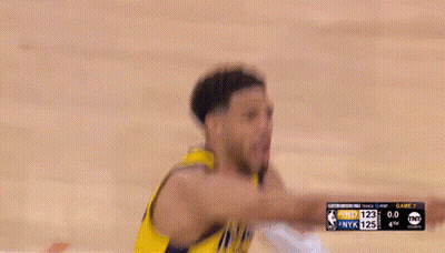 Man In Yellow And Black Basketball Uniform Holding Neck GIF