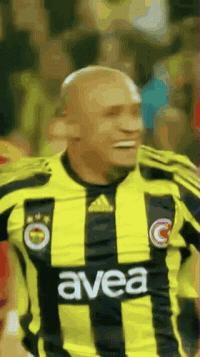 Man In Yellow And Black Striped Shirt Saying Avea GIF